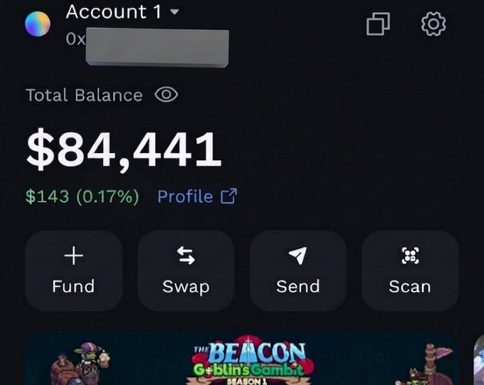 The image features an overlay of a wallet, with various buttons for transactions and account information displayed. The viewer can see that a total balance of $84,411 has been added to their account. There are several other buttons related to sending and receiving money, such as "Send" and "Scan". These different options allow the user to manage their finances effectively through mobile payments or banking services provided by Ronin Wallet.