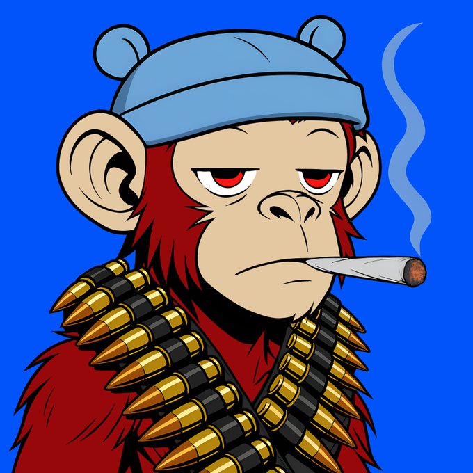 A cartoon-style illustration of a monkey with red fur wearing a light blue beanie and bandoliers of gold bullets, smoking a joint against a bright blue background.