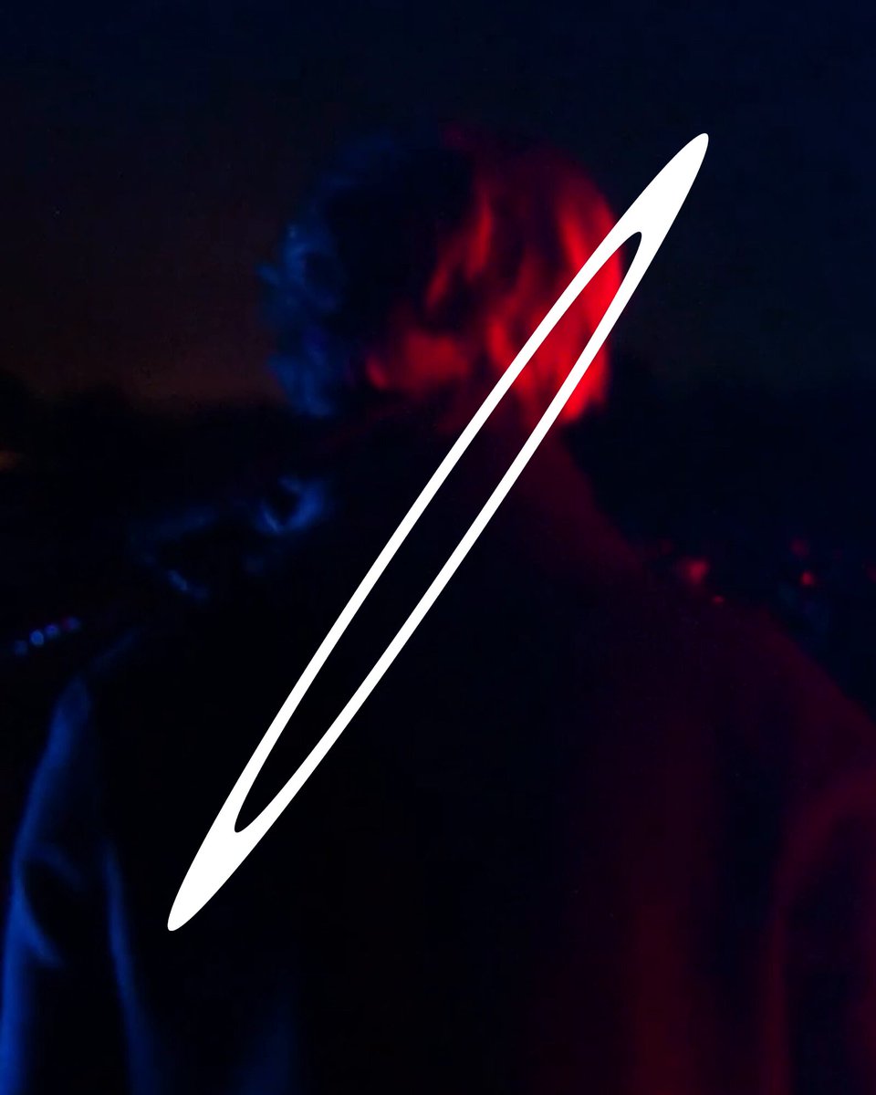 The image shows a person wearing a black jacket with white lines drawn on their back. The background is dark, creating an atmosphere that complements the design on the person's back. The text "From Istanbul to Bali, London, New York and Jakarta" suggests that this person might be traveling or visiting various places around the world. The image also contains a link to another post titled "From Istanbul to Bali, London, New York and Jakarta", which could be related to the person's journey or experiences in these locations.