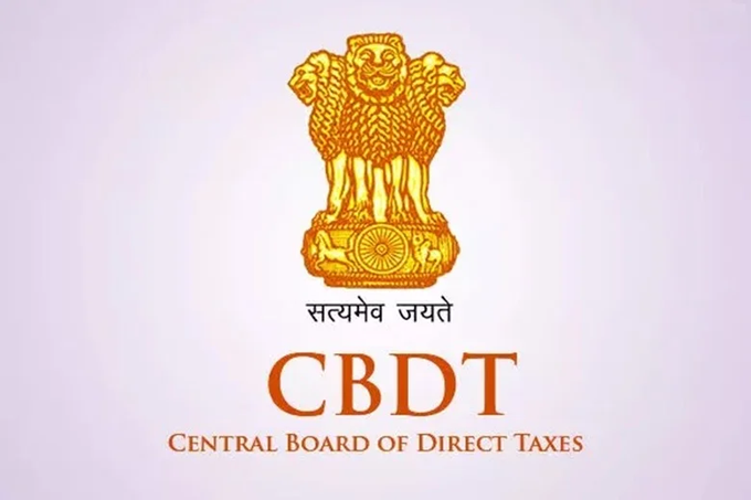 The image displays the official emblem of the Central Board of Direct Taxes (CBDT), featuring India's national symbol—the Lion Capital of Ashoka—above the Sanskrit motto "सत्यमेव जयते" and the acronym "CBDT" with its full name beneath, set against a soft lavender background. This emblem represents the government body issuing the new crypto tax reporting guidelines referenced in the post.
