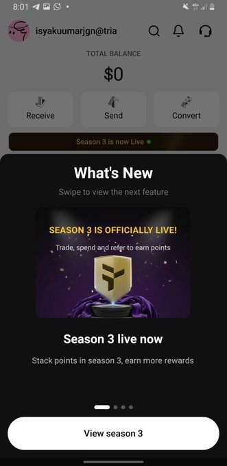 The image shows a phone screen with an app called "What's New" displayed, which appears to be related to a social media platform or streaming service. The main focus of the image is a post from the Instagram account @useTria, where they are promoting their leaderboard for season 3. The post includes a photo and text that reads: "Happy Sunday frens If you'r participating @useTria I highly recommend you to dive into Tria season and participate inside @MindoAI leaderboard". This message encourages users to engage with the content on the app, specifically by watching the new season of their favorite show or streaming service.