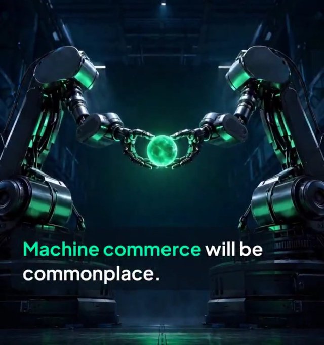 Two robotic arms hold a glowing green sphere in a dark industrial setting, with the text 'Machine commerce will be commonplace.' displayed below.