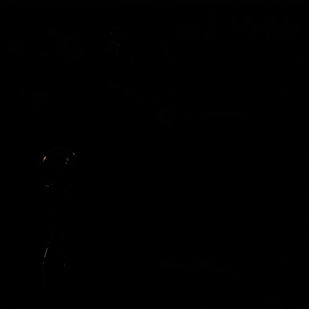 The image shows a black background with a white silhouette of a person's face against it. The caption reads "Base onchain AI agents are moving beyond DeFi. @turfsports_ just shipped Coach the first AI sports assistant living in your iMessage. Starting June 15 he runs “Prove You Know Ball”: 5 challenges, winner takes 4 World Cup QF tickets in LA."