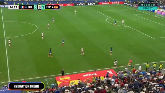 A broadcast screenshot of a soccer match between France (FRA, 0) and Spain (ESP, 1) at 26:23, during a hydration break.
