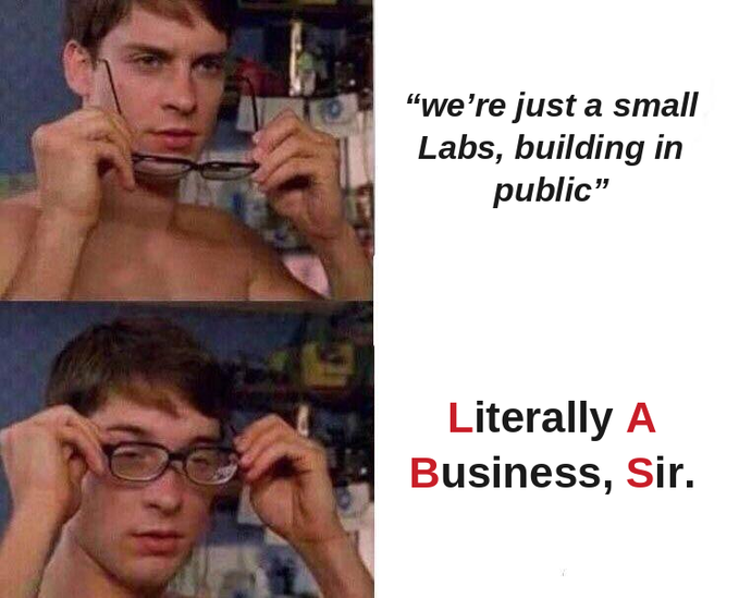 A two-panel meme features a young man putting on glasses with the text 'we're just a small Labs, building in public' in the top panel and 'Literally A Business, Sir.' in the bottom panel.