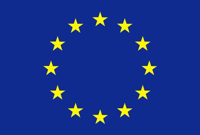 The European Union flag featuring a circle of twelve yellow stars on a blue background.