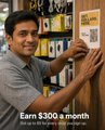 A man wearing glasses stands in front of a shelf of products, reaching toward the right, with overlaid text reading "Earn $300 a month" alongside a company name and website. The image relates to the post by promoting an app-based profit-earning opportunity, suggesting users can earn and withdraw money through ZarPay at competitive rates.