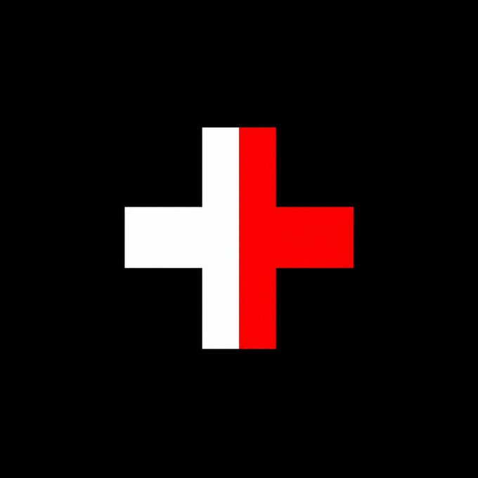 A red cross with a white border, resembling a plus sign, centered on a black background.