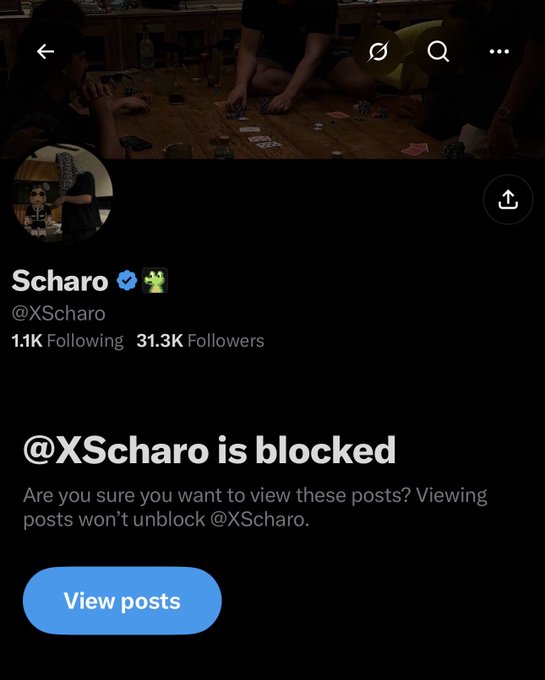 A Twitter/X profile page for @XScharo showing "1.1K Following" and "31.3K Followers" with a message indicating "@XScharo is blocked".
