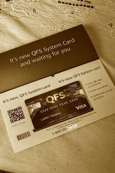 A photograph of a QFS System card and its packaging on a white embroidered fabric, labeled as 'SAMPLE / DEMO / CONCEPT' for 'LARRY TRANS' with instructions to scan a QR code and confirm email concept activation.
