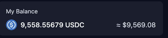 A digital wallet balance display showing 'My Balance' with 9,558.55679 USDC, equivalent to approximately $9,569.08.