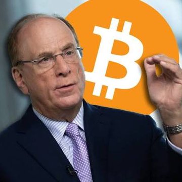 A man in a dark suit, striped shirt, and lavender tie gestures with his hand in front of a large orange Bitcoin logo backdrop. The image relates to the post about Mubadala's $400 billion Abu Dhabi fund potentially acquiring Bitcoin exposure through US wrappers like BlackRock's IBIT ETF rather than directly via VARA, sparking debate over sovereign crypto custody methods.