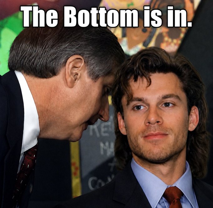 Two men in suits appear in a meme with the caption "The Bottom is in." overlaid at the top.