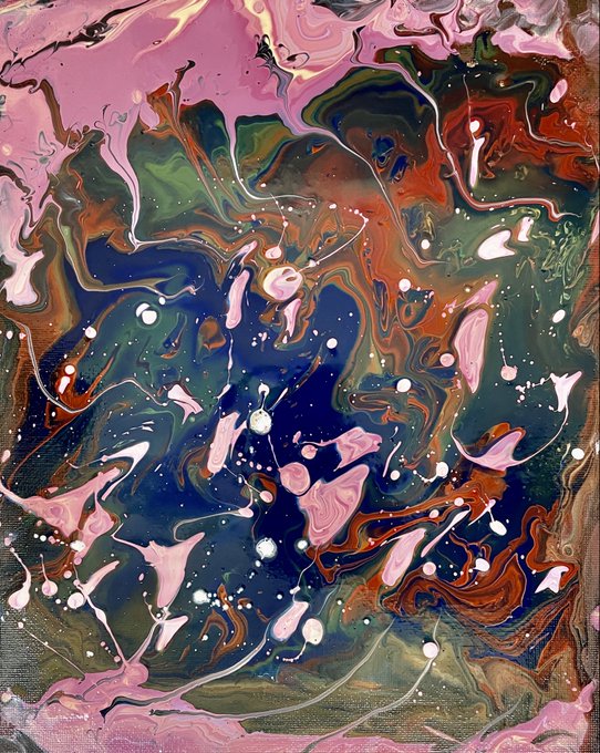 An abstract acrylic pour painting featuring swirling patterns of pink, green, orange, and deep blue with scattered white droplets.