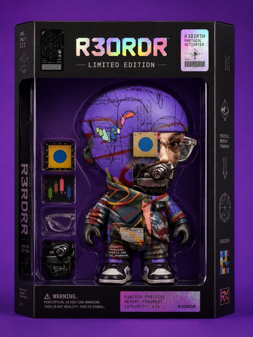 A packaged limited edition 'R3ORDR' designer toy figure with a purple head and mechanical accessories, labeled 'R3B1RTH PROTOCOL INITIALIZED' and featuring a 'WARNING: PERCEPTUAL DEVIATION WARNING THIS IS NOT REALITY. THIS IS SIGNAL' disclaimer.
