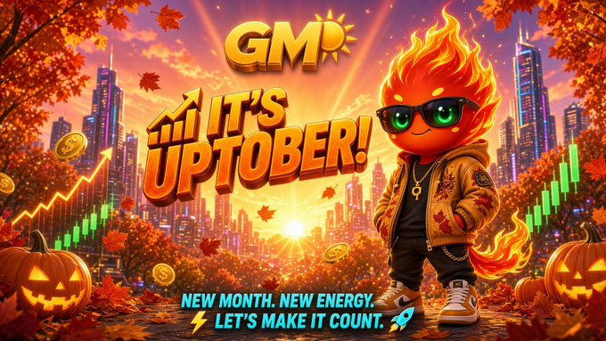 A vibrant promotional graphic reading 'GM' and 'IT'S UPTOBER!' featuring a flame-headed cartoon character wearing sunglasses against a city skyline with falling autumn leaves, pumpkins, and stock charts.