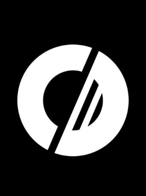 A black and white circular logo featuring a diagonal slash design with the letter 'D' in the center.