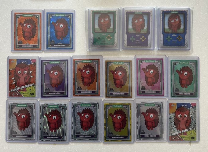 The image features a collection of 16 trading cards, each with a unique design featuring a hedgehog character. The cards are neatly arranged next to one another, showcasing their vibrant colors and intricate artwork. The post about these cards seems to be related to the hedgehog characters featured on them, possibly discussing the release or significance of the cards.