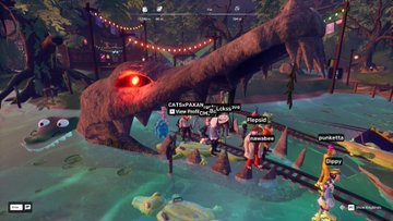The image shows a group of people standing around a large, fake alligator-like creature that has been placed in a body of water. The scene appears to be from an online game or multiplayer video game where players are interacting with each other while navigating through various challenges and obstacles. The main focus is on the giant alligator, which serves as a central point for the group's activities.