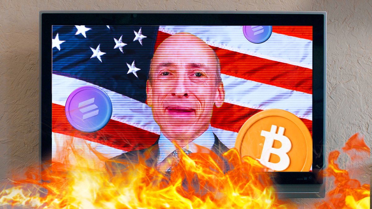 A TV screen displaying a bald man's face against an American flag background, overlaid with Solana and Bitcoin logos, with flames burning in the foreground.