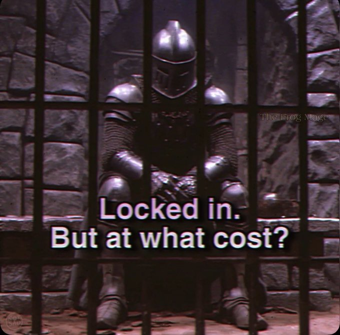 A suited knight sits behind prison bars, overlayed with the text, “Locked in. But at what cost?” A small “The Frog Mage” watermark is visible, fitting the accompanying “Gm CT” crypto-community greeting.