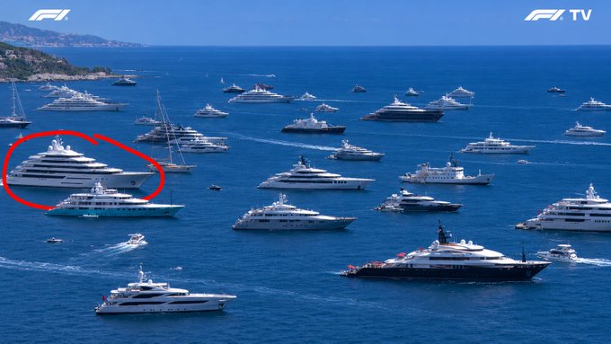 The image shows a large group of boats floating on the water, with some boats being white and others blue. There are at least 14 boats visible in the scene. The boats vary in size and shape, creating an interesting visual effect as they float together in the ocean. The photo is taken from an aerial perspective, providing a unique view of the boats and their surroundings. The caption "While everyone talking about the bear market average $LAB holder grocery run" suggests that there might be some discussion or interest in the boats' value or purpose, possibly related to the fishing industry or other maritime activities.