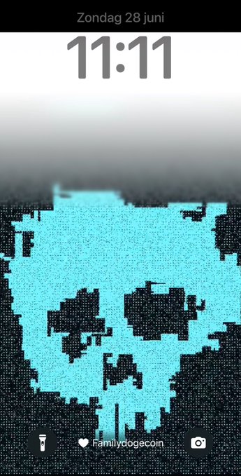 A smartphone lock screen displays "Zondag 28 juni" and the time "11:11" above a pixelated turquoise skull artwork credited to "Familydogecoin," matching the post's 11:11 GM theme shared by @nf_suzanne referencing art from @LoroMasnah shown at the NFC summit in Lisbon.
