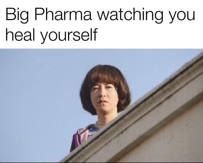 A meme image shows a woman peering over a wall with the caption "Big Pharma watching you heal yourself" at the top.