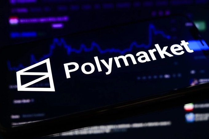The image features a cell phone with the word "Polymarket" displayed on its screen. The phone's display shows a graph or chart, possibly representing stock market data. The text in the image reads, "The craziest part isn't the predictions it's the execution layer." This phrase is related to the execution of trades and how they are executed by Polymarket. It suggests that the trading system adapts and learns from real-time market conditions, resulting in more efficient and intelligent trade execution compared to traditional methods.