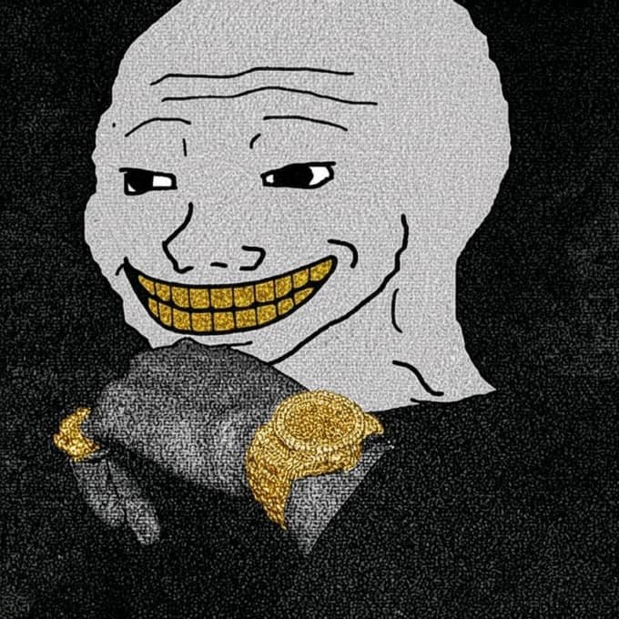 A "Trollface" style meme image showing a smiling gray cartoon face with gold teeth and gold rings, wearing a suit, against a black textured background.
