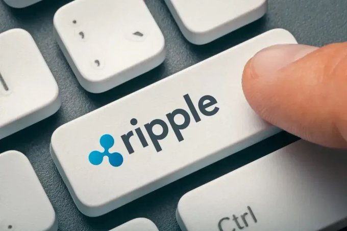 A close-up image of a finger pressing a white computer keyboard key labeled with the 'ripple' logo and text, with a 'Ctrl' key visible below.