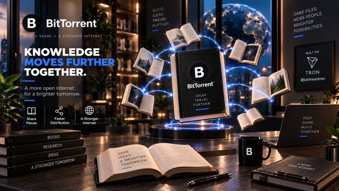 A BitTorrent promotional banner with the tagline 'Knowledge Moves Further Together' features a black book labeled 'BitTorrent' surrounded by floating open books connected by glowing blue lines, set on a desk with a laptop, mug, and books.