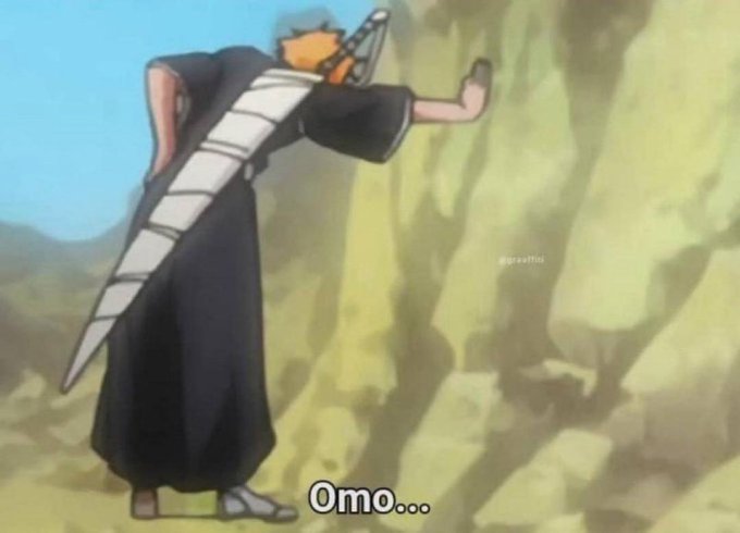 An anime character with orange hair and a large sword strapped to his back presses against a rock wall, with the caption 'Omo...' displayed at the bottom.
