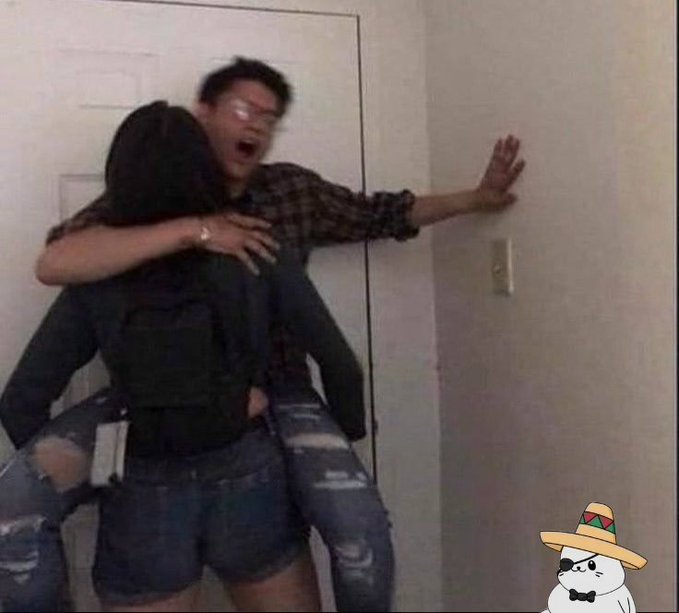 A blurry photo shows a person in a black hoodie embracing someone against a wall, with a small cartoon character wearing a sombrero and bow tie in the bottom right corner.