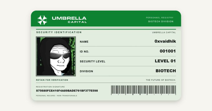 The image shows a green Umbrella Capital personnel ID badge from the Biotech Division, displaying the name "0xvaidhik," ID No. "001001," Security Level "LEVEL 01," and a barcode matching the registry signature "S75680FCE416F4A89BADE761BF377E598" from the post, confirming new member verification on Umbrella Capital's platform.
