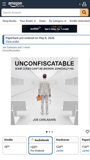 An Amazon Prime page displaying the paperback pre-order of 'UNCONFISCATABLE: SOME CODES CAN'T BE BROKEN. ESPECIALLY HIS.' by Joe Carlasare, with pricing options for Kindle ($9.99), Audiobook ($20.66), Hardcover ($24.99), and Paperback ($14.99).