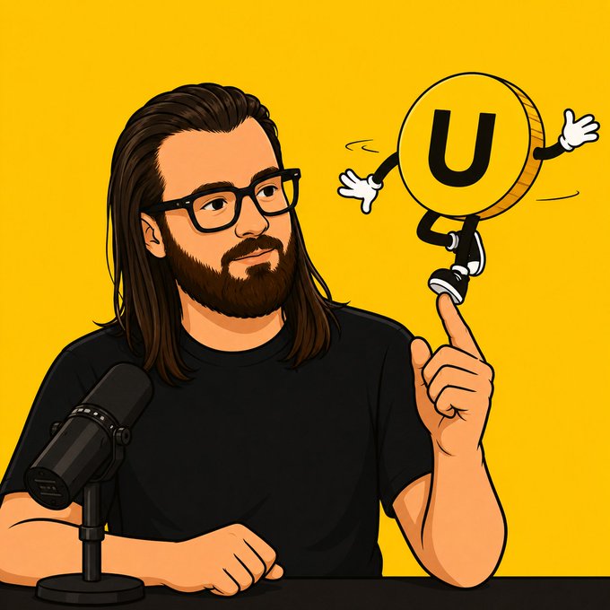 Murad is featured with a cartoon coin labeled "U" on its surface, playfully balanced on his finger, illustrating his apparent affection for "Useless coins."