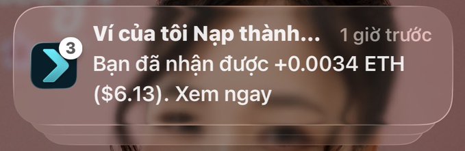A Vietnamese phone notification from an app called 'Nạp thành...' with 3 alerts, stating 'Bạn đã nhận được +0.0034 ETH ($6.13). Xem ngay' (You have received +0.0034 ETH ($6.13). View now), sent 1 hour ago.