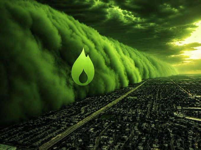 A dramatic aerial view of a massive, towering green dust storm or cloud formation advancing over a sprawling city, overlaid with a bright green flame or droplet logo in the center.