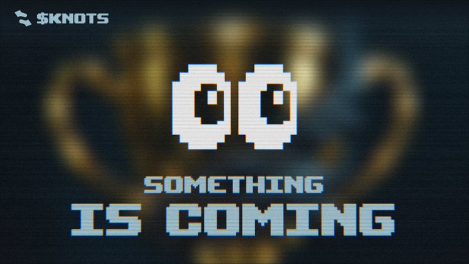 A pixelated promotional graphic from the $KNOTS project displays two stylized eye icons with the text "SOMETHING IS COMING," teasing an upcoming announcement that aligns with the post's anticipation of a potential 10x price movement. The cryptic teaser image reinforces the community's excitement about the imminent reveal.