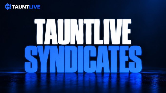 A promotional graphic displays 'TAUNTLIVE' in white text above 'SYNDICATES' in large blue 3D letters against a dark blue background, with the TauntLive logo in the top left corner.
