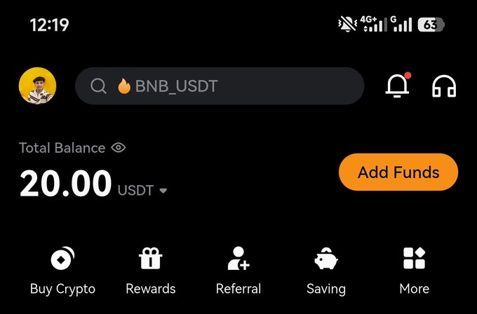 Screenshot of a cryptocurrency trading app showing a Total Balance of 20.00 USDT with BNB_USDT in the search bar, and quick options for Buy Crypto, Rewards, Referral, Saving, and More.
