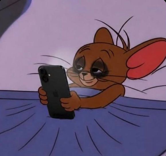 An animated cartoon image of Jerry from Tom and Jerry lying on a pillow in bed, smiling while looking at a smartphone.