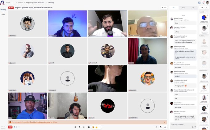 A Zoom meeting titled 'Region Updates: Brazil Roundtable Discussion' showing a grid of video participants in a group call, with a chat panel on the right side.