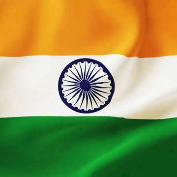 The Indian flag waves prominently in the image, symbolizing the country referenced in the breaking news about authorities investigating offshore crypto-to-gift-card channels used by Indians to convert cryptocurrency into vouchers for everyday purchases like groceries, fuel, and mobile recharges. The flag serves as a visual representation of India, where concerns over tax evasion, anti-money laundering (AML), and cross-border implications are driving the regulatory scrutiny.