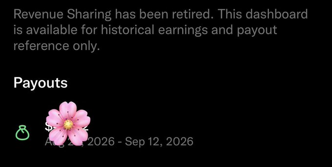 A dark dashboard screen displaying a message that 'Revenue Sharing has been retired' and is now available for historical earnings and payout reference only, with a 'Payouts' section partially obscured by a cherry blossom flower sticker.