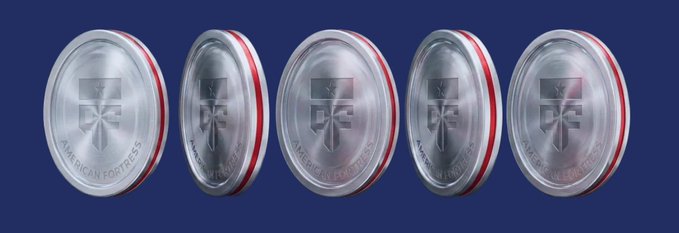Five rotating silver 'American Fortress' branded metal containers with red trim, displayed against a dark blue background.