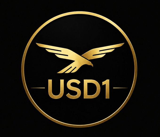 A gold circular emblem on a black background features a soaring eagle above the text "USD1," visually reinforcing the stablecoin's branding as it's highlighted in the post for its growing role as foundational infrastructure in a new yield vault launched by UltraYield in partnership with World Liberty Financial.