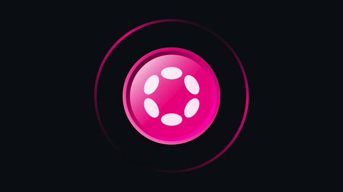 A glowing pink circular emblem with five white dots arranged in a ring, set against a dark background.