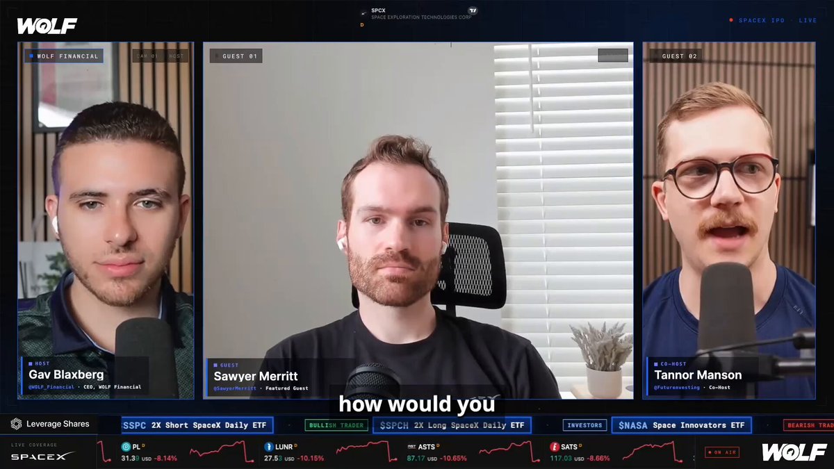 The image shows a screenshot from an online video conference with three men sitting down for an interview session. They are shown in different positions within the frame, suggesting that they might be taking turns or interacting with one another during the interview. The background of the picture features a window with blinds and a potted plant on the windowsill, adding to the overall ambiance of the scene. The image also includes text providing information about an upcoming spaceship-building project, specifically about the Starship, which appears to be related to their video conference discussion or event that is taking place in real time.